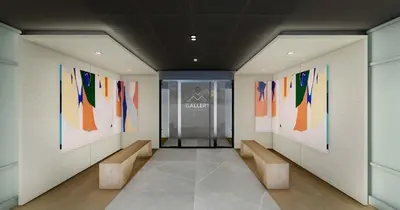 a hallway with colorful paintings on the walls at Apartment Gallery Mont Blanc Saint-Gervais-Les-Bains in Saint-Gervais-les-Bains