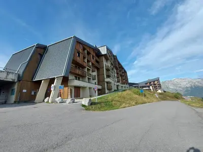 an empty street in front of a building at Appartement skis aux pieds à Samoëns 1600 - FR-1-624-79 in Samoëns