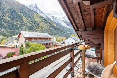 a balcony with a view of a mountain at Neige Apartment - Chamonix All Year in Chamonix-Mont-Blanc