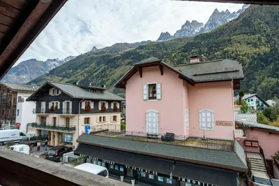 a view of a town with mountains in the background at Neige Apartment - Chamonix All Year in Chamonix-Mont-Blanc