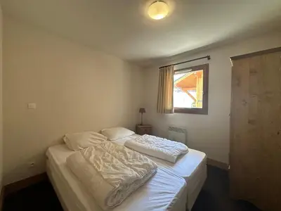 two bunk beds in a room with a hallway at Appartement spacieux 4 chambres, pieds pistes, parking inclus - FR-1-642-4 in Morillon