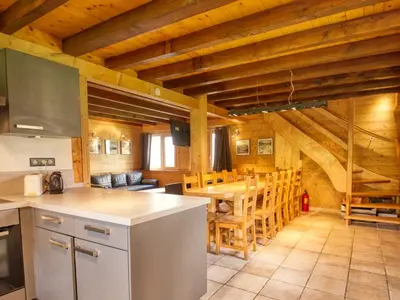 a kitchen and dining room in a log cabin at Chalet au pied des pistes, sauna et terrasse, pour 12 pers. - FR-1-642-5 in Morillon