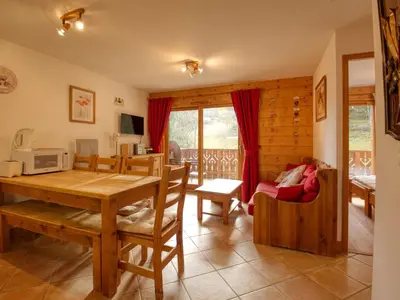 a kitchen and dining room with a table and chairs at Appartement 2 ch - 6 pers - Pieds des pistes à Morillon - FR-1-642-21 in Morillon