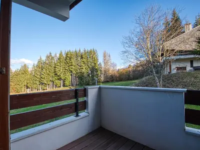 an apartment building with balconies on the side of it at Appartement 4 personnes, prox. pistes et jardin d'enfants - FR-1-642-41 in Morillon