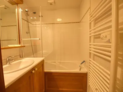 a bathroom with a tub and a sink and a shower at Appartement cosy 6 pers avec balcon en montagne - FR-1-642-53 in Morillon