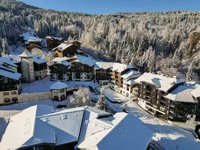a view from the balcony of a house at Confortable appartement à Morillon 1100 pour 5 pers, TV, animaux admis - FR-1-642-45 in Morillon