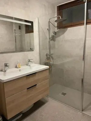 a bathroom with a sink and a shower at DRYADES SAINT GERVAIS in Saint-Gervais-les-Bains