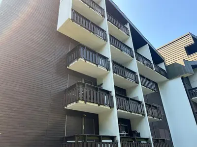 an apartment building with balconies on the side of it at Studio chaleureux avec balcon au centre de Samoëns - FR-1-624-83 in Samoëns
