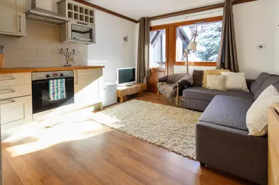 a bunk bed room with two bunk beds in it at Les Grand Balcon - 2ch - 2 balcons - Randonnée - Escalade - Lac des Chavants in Les Houches
