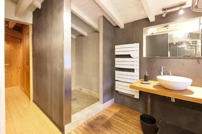 a bathroom with a sink and a shower at Chalet of the 5 Chardons ski-in ski-out in Les Houches