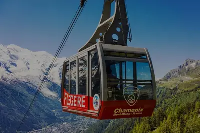 a gondola ride in the mountains with mountains at Majestic Broadway - 4 star apartment with spectacular views in Chamonix-Mont-Blanc