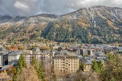 an overview of a city with mountains in the background at Majestic Broadway - 4 star apartment with spectacular views in Chamonix-Mont-Blanc