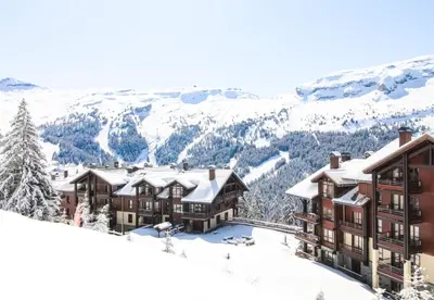 an aerial view of a resort in the snow at Appartement Premium à Flaine, altitude 1740 m, 8 à 10 personnes, au pied des pistes, piscine, jacuzzi, sauna, hammam et salle de sport in Flaine