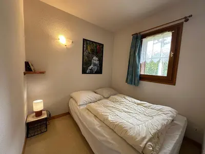 a small bedroom with a bed and a window at Appartement spacieux 6 pers. proche jardin d'enfants - FR-1-642-58 in Morillon