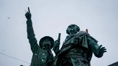a statue of two people with weapons on at Studio Le 4122 - Chamonix centre Clos du Savoy in Chamonix-Mont-Blanc