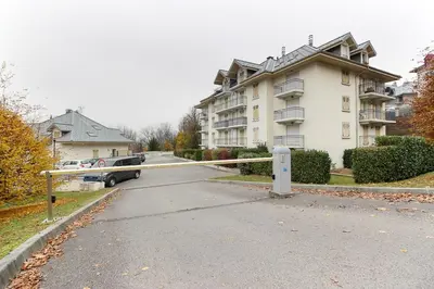 a street with a gate in front of a house at Appartement L'Armancette - Proche centre et Bettex in Saint-Gervais-les-Bains