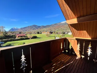 a balcony with a view of the mountains at Confortable T2 proche télécabine Grand Massif - FR-1-624-41 in Samoëns