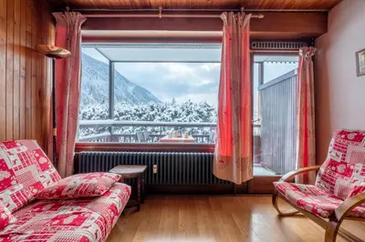 a living room with a view of a mountain at Apartment With Balcony Close To The Ski Slopes in Chamonix-Mont-Blanc