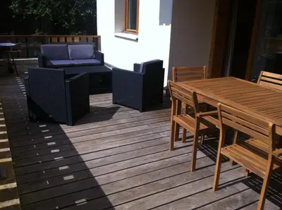 a view from the deck of a cabin in the mountains at L'Eden Ski aux Pieds in Morillon