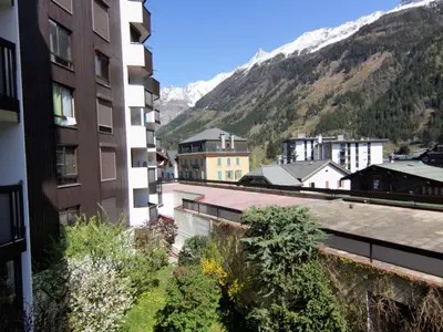 a view of a city with mountains in the background at Apartment Le Beau Site by Interhome in Chamonix-Mont-Blanc