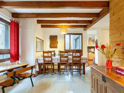 a dining room with a table and chairs at Apartment Le Diorama-3 by Interhome in Saint-Gervais-les-Bains