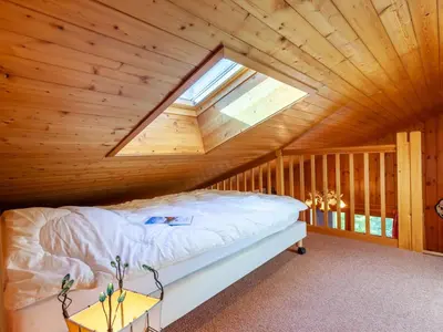 a balcony with a table and chairs and mountains at Studio la Pointe d'Anterne by Interhome in Saint-Gervais-les-Bains