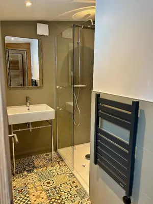 a bathroom with a shower and a sink at Gorgeous Mini-Chalet Chamonix in Chamonix-Mont-Blanc