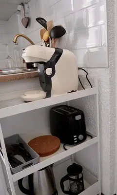 a mixer sitting on a shelf in a kitchen at Cocon du Front de Neige in Demi-Quartier