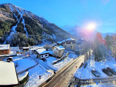 a town in the mountains with snow on the ground at Grand Studio Aiguille du Midi et vue Mont Blanc in Chamonix-Mont-Blanc
