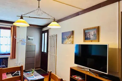 a kitchen with a sink and a counter top at Family House With Balcony Garden Wi Fi in Chamonix-Mont-Blanc