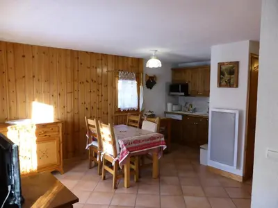 a kitchen and dining room with a table and chairs at Résidence Les Carlines - Carlines 3 MAE-8424 in Les Contamines-Montjoie