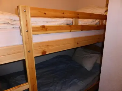 a couple of bunk beds in a room at Résidence Les Carlines - Carlines 3 MAE-8424 in Les Contamines-Montjoie