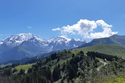 a view of a mountain range with snow capped mountains at Apartment With View On The Mont Blanc in Saint-Gervais-les-Bains