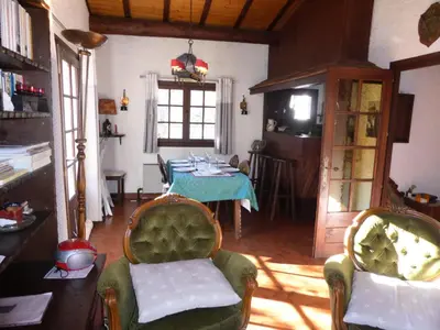 a living room with a table and chairs at Chalet Santa Claus - Chalet Santa Claus MAE-7284 in Les Contamines-Montjoie