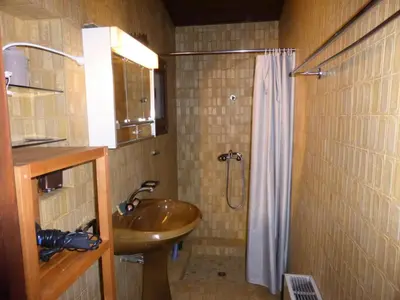 a bathroom with a sink and a shower at Chalet Santa Claus - Chalet Santa Claus MAE-7284 in Les Contamines-Montjoie