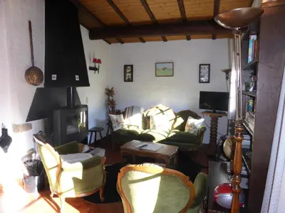 a living room with a couch and a fireplace at Chalet Santa Claus - Chalet Santa Claus MAE-7284 in Les Contamines-Montjoie