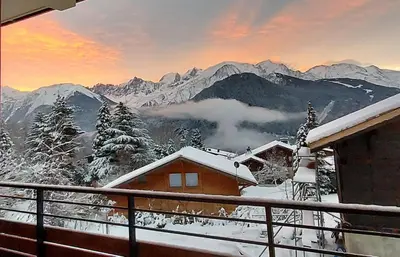 a cabin in the snow with a view of mountains at New Spacious Appart. Incredible view of Mt Blanc in Passy
