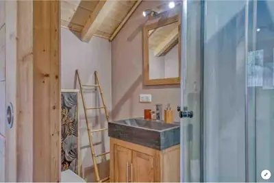 a bathroom with a sink and a mirror at Mazot savoyard situé à 25 kms de CHAMONIX in Saint-Gervais-les-Bains