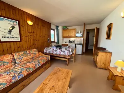 a living room with a couch and a table at Appartement lumineux au pied des pistes avec accès direct Grand Massif - FR-1-624-100 in Morillon
