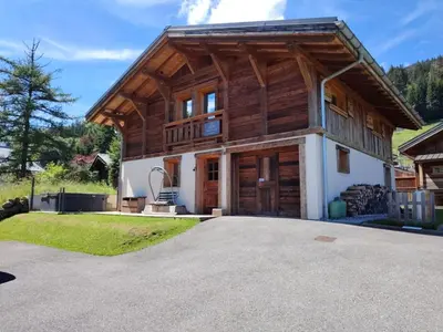 a log home with a large garage at Vielyterra - Chalet haut de gamme - Domaine du mont blanc in Saint-Gervais-les-Bains