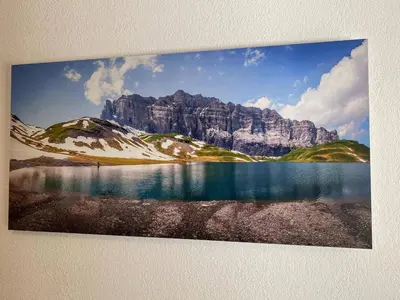 a picture of a mountain with a lake in front of it at Appartement 3 pièces avec terrasse, animaux acceptés et parking - FR-1-629-106 in Samoëns