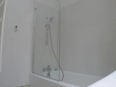a shower with a glass door in a bathroom at Appartement 3 pièces avec terrasse, animaux acceptés et parking - FR-1-629-106 in Samoëns
