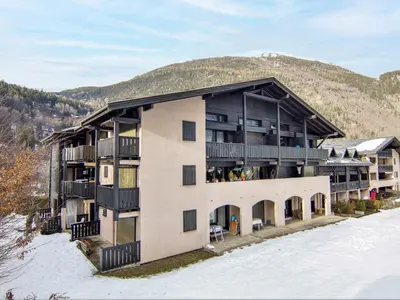 an aerial view of a building in the snow at Studio Les Arandellys by Interhome in Les Houches