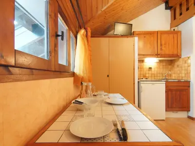 a kitchen with a counter with two dishes on it at Studio Les Arandellys by Interhome in Les Houches