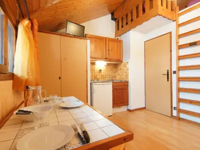 a kitchen with a counter with two sinks in it at Studio Les Arandellys by Interhome in Les Houches