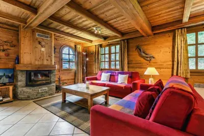a house with snow on the ground at Chalets d'Henri 67 - Happy Rentals in Chamonix-Mont-Blanc
