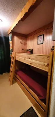 a large wooden bunk bed in a room at Résidence Ecrin Des Glaciers Daim - Ecrin des Glaciers D41 MAE-6334 in Combloux