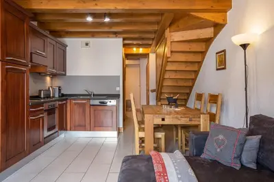 a bathroom with a white sink and a mirror at Chateau - Charming Apartment in the city Center with 3 bedrooms - By Cozee Rentals in Saint-Gervais-les-Bains