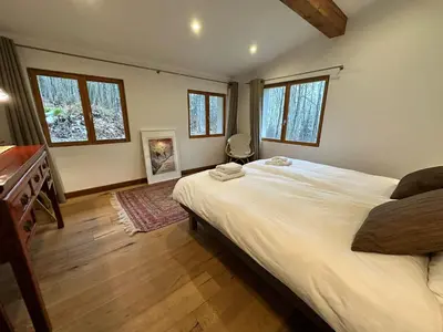 a bathroom with a shower and a toilet and a tub at Chalet Fleur de Lys - Chalet 4BR Wood Stove , Home Cinema , Parental Suite - By Cozee Rentals in Les Houches