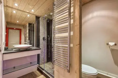 a bathroom with a sink and a toilet and a shower at La Blaitière - Luxe Apart Center Chamonix , Next to Piste Planard - By Cozee Rentals in Chamonix-Mont-Blanc